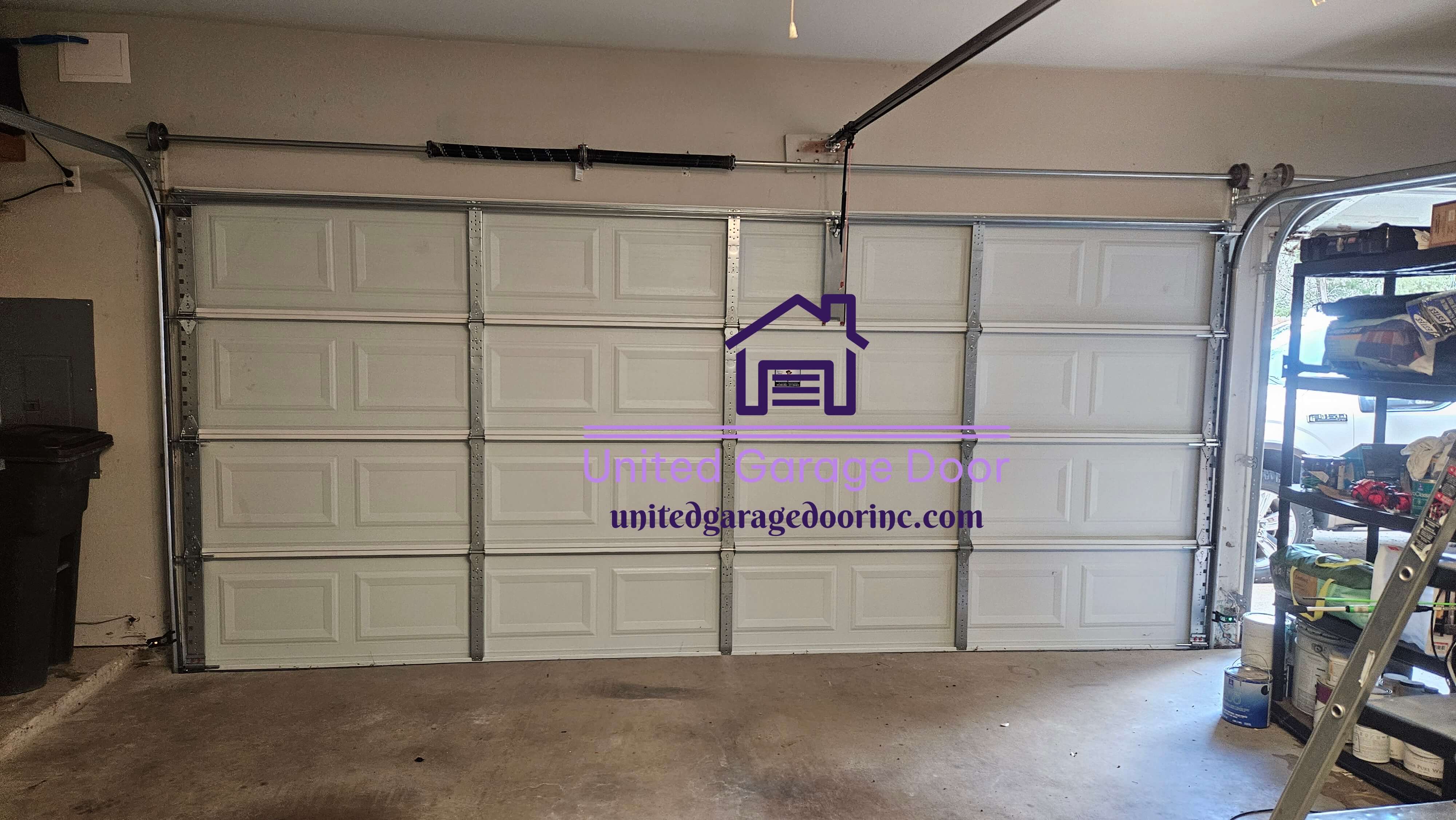 unitedgaragedoorinc.com_garage_door_torsion_spring_replacement